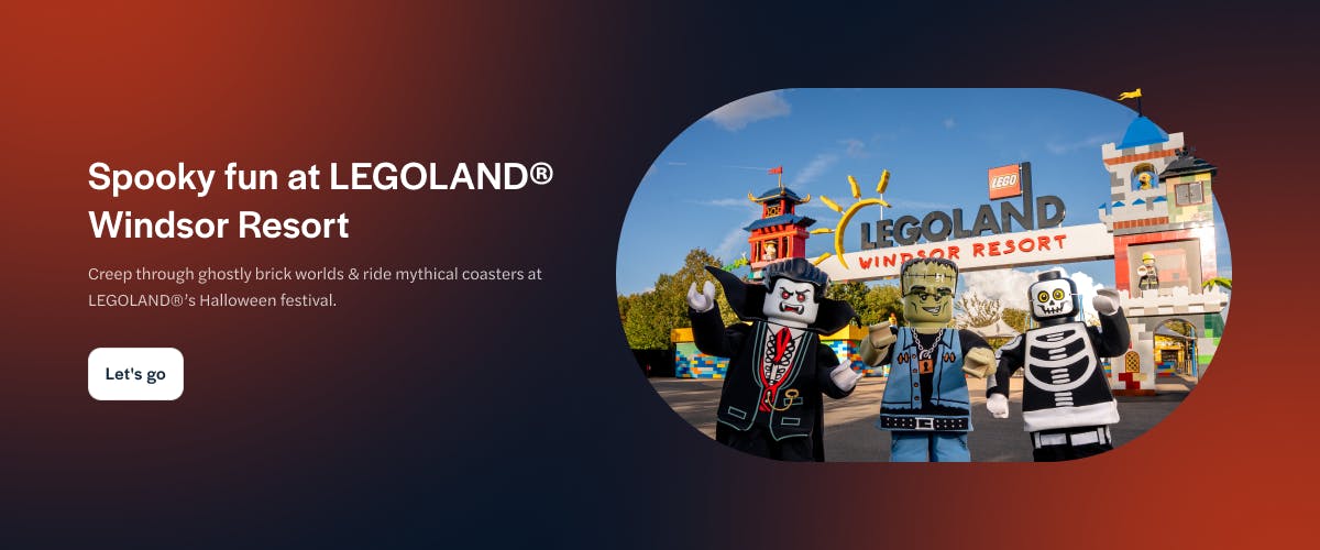 LEGO characters in Halloween costumes at LEGOLAND Windsor Resort entrance.